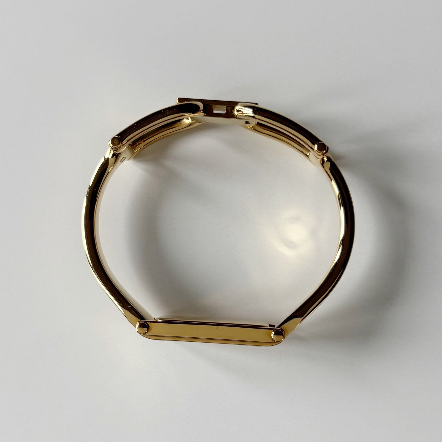 Gucci 1990s Gold Rectangular Dial Gold Plated Bangle Watch (Small)