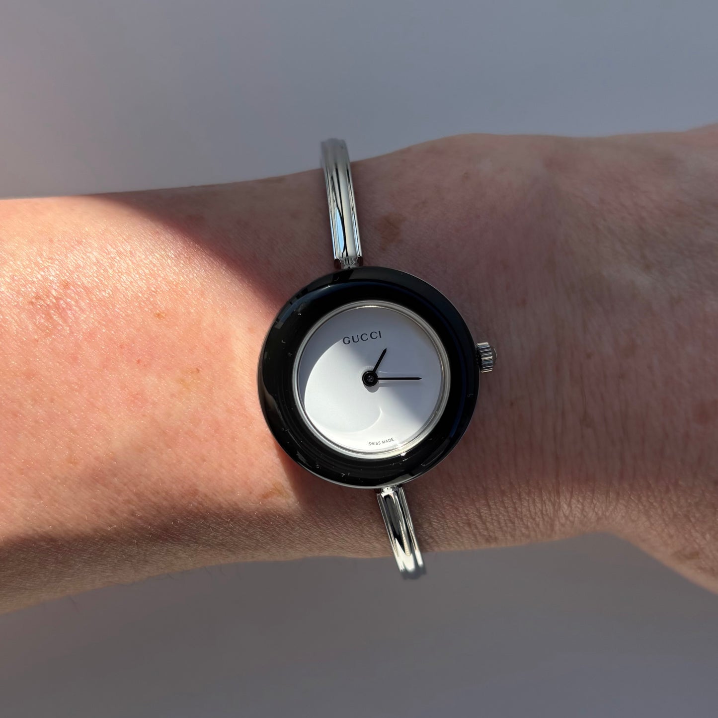 Gucci 1990s Interchangeable Bezel Stainless steel Bangle Watch with 12 bezels, case