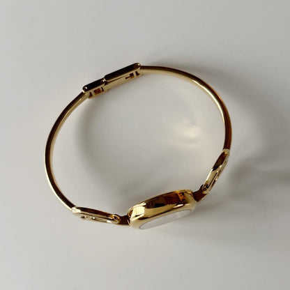 Gucci 1990s Seashell Dial Gold Plated Bangle Watch