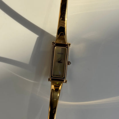 Gucci 1990s Seashell Dial Rectangular Gold Plated Bangle Watch