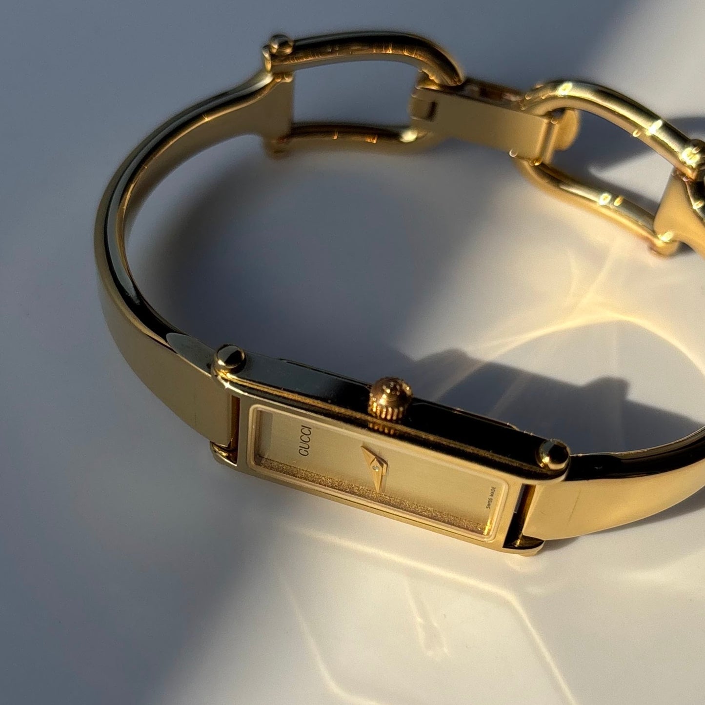 Gucci 1990s Gold Dial Rectangular Gold Plated Bangle Watch