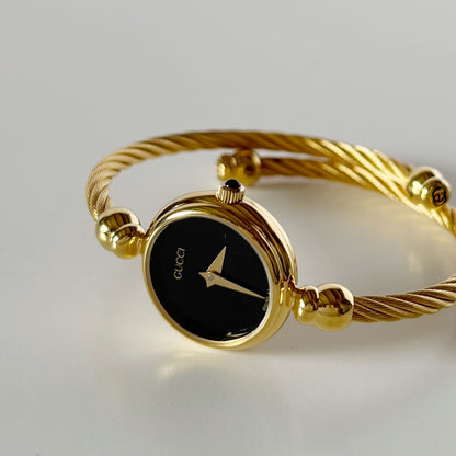 Gucci 1990s Black Dial Gold Plated Cable Bangle Watch