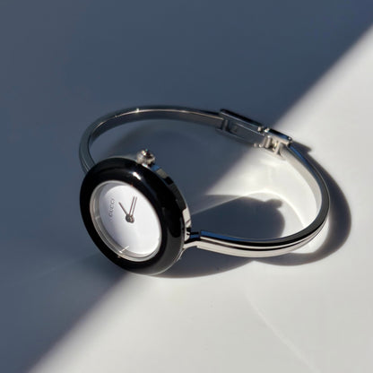 Gucci 1990s Interchangeable Bezel Stainless steel Bangle Watch with 12 bezels, case