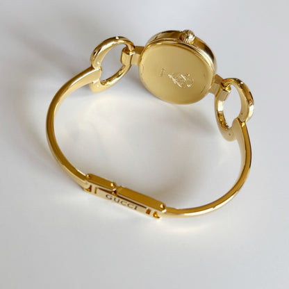 Gucci 1990s Oval Black Dial Gold Plated Bangle Watch (Small)