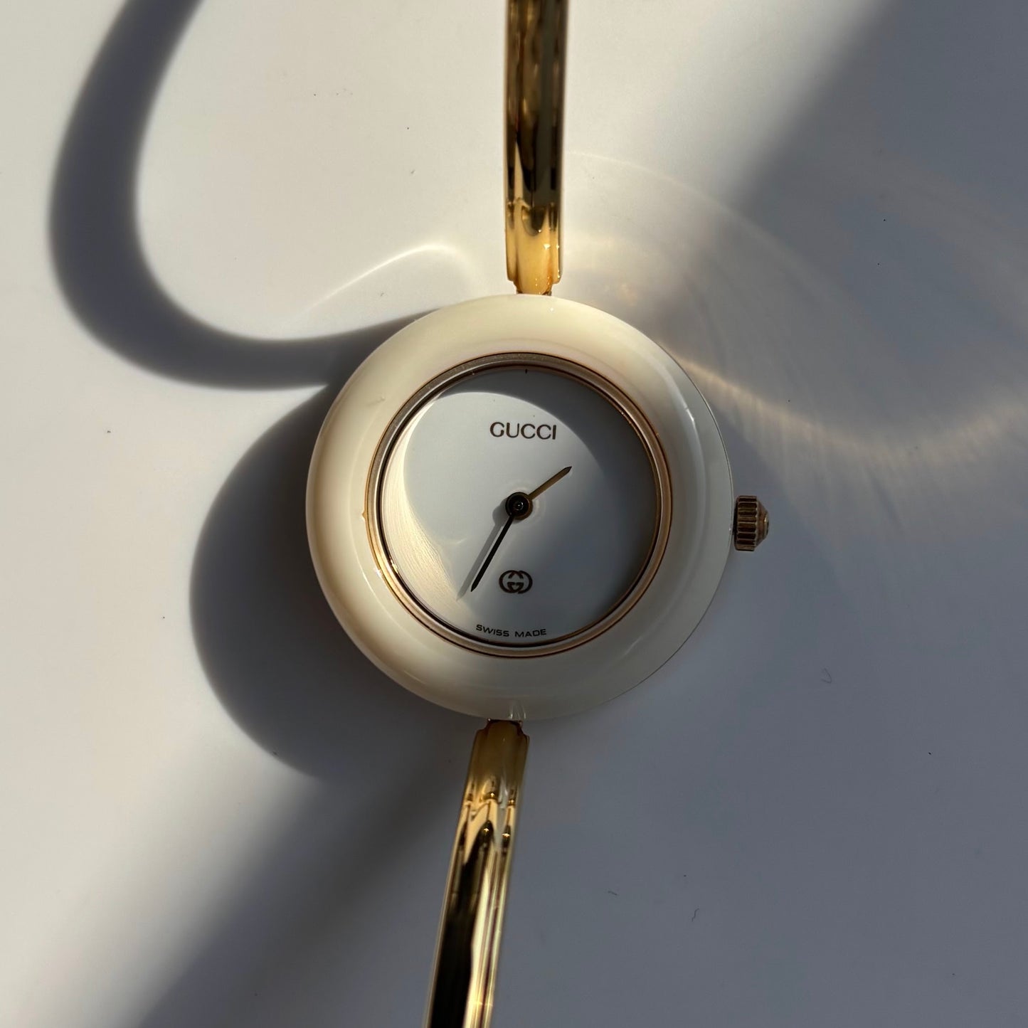 Gucci 1990s Interchangeable Bezel Gold Plated Bangle Watch with 12 bezels, case