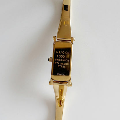 Gucci 1990s Rectangular Gold Dial Gold Plated Bangle Watch