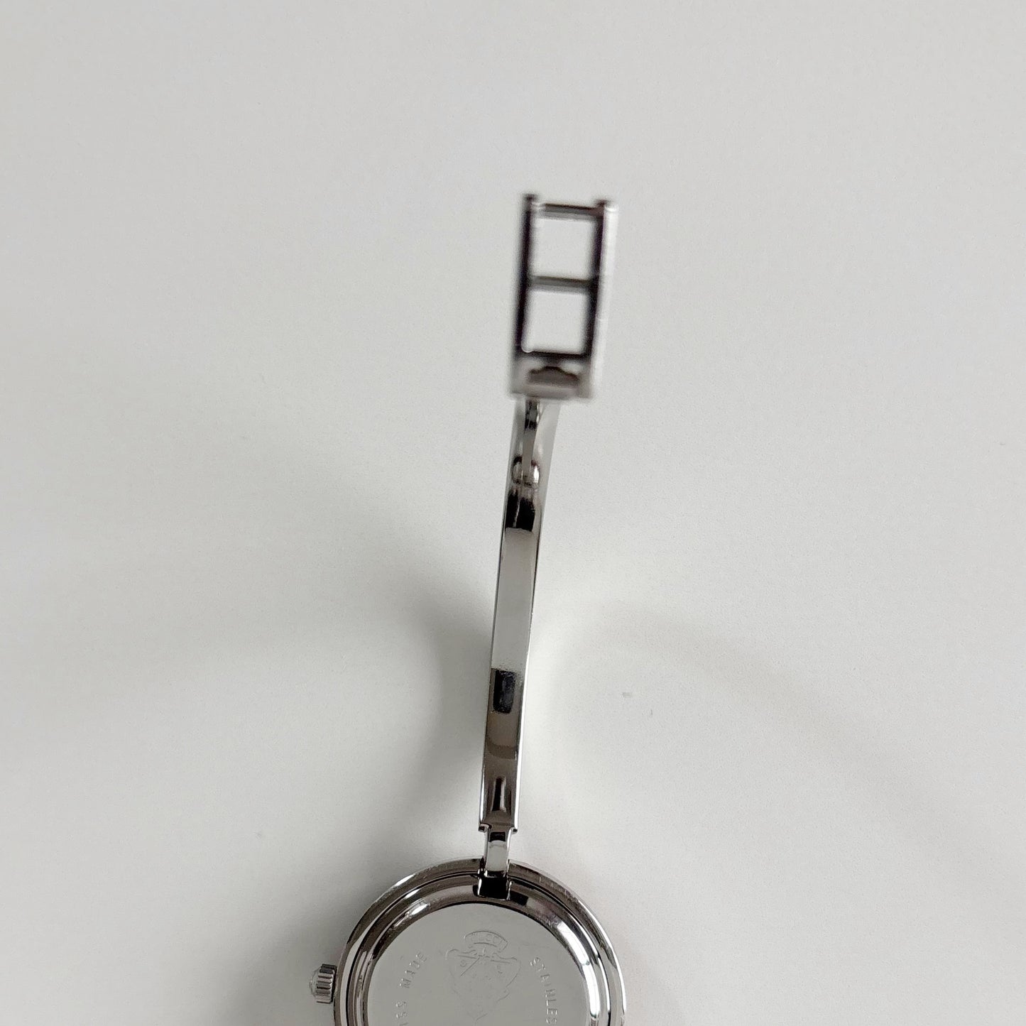 Gucci 1990s Interchangeable Bezel Stainless steel Bangle Watch with 12 bezels, case