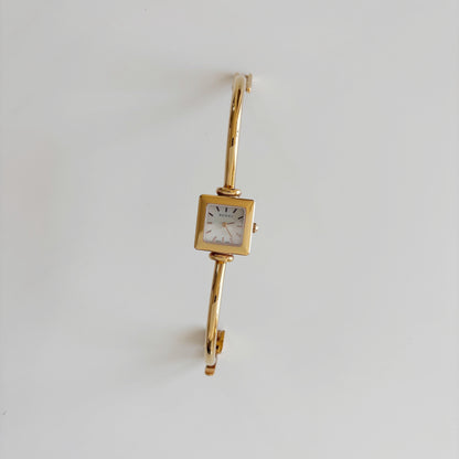 Gucci 1990s Seashell Square Dial Gold Plated Bangle Watch