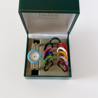 Gucci 1990s Interchangeable Bezel Gold Plated Bangle Watch with 12 bezels, case