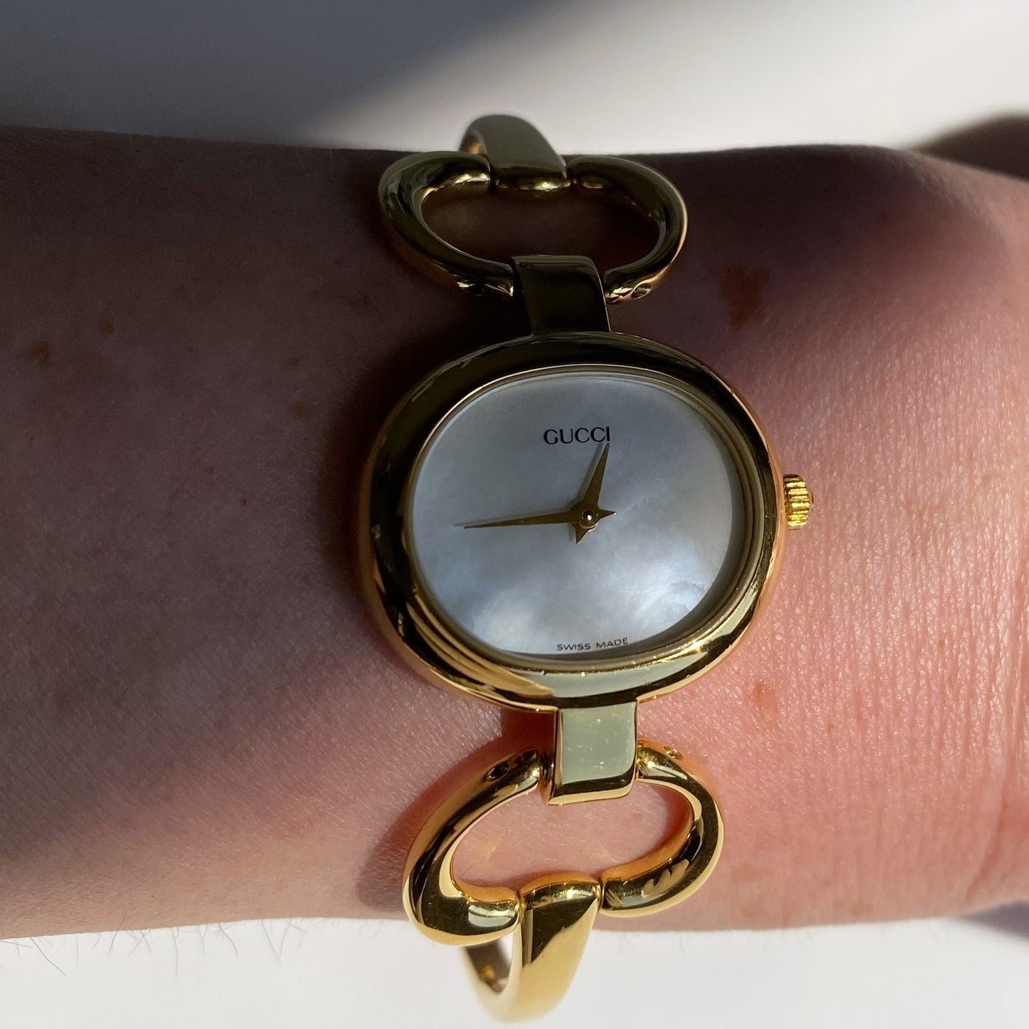 Gucci 1990s Seashell Dial Oval Gold Plated Bangle Watch