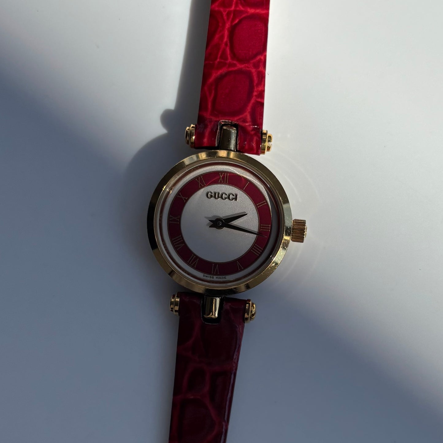 Gucci 1990s Red Dial Sherry Gold Plated Watch