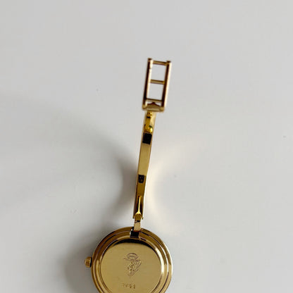 Gucci 1990s Interchangeable Bezel Gold Plated Bangle Watch with 12 bezels, case (Small)