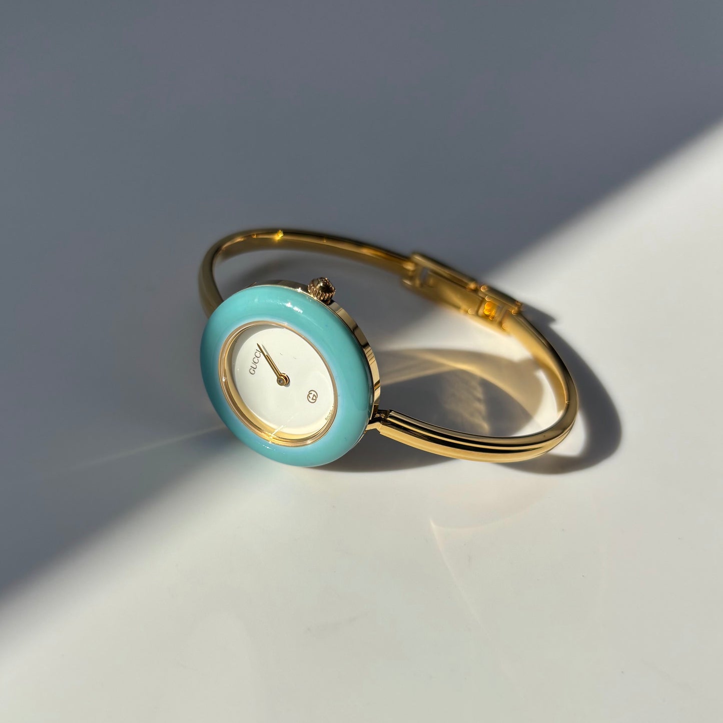 Gucci 1990s Interchangeable Bezel Gold Plated Bangle Watch with 12 bezels, case