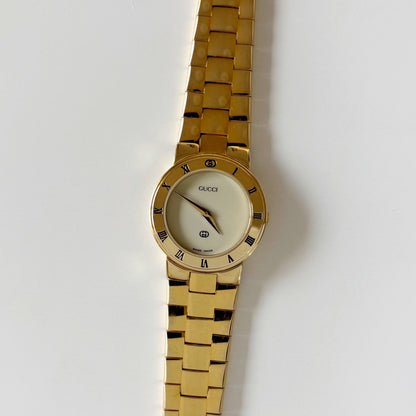Gucci 1990s Round Dial Gold Plated Watch