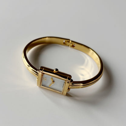 Yves Saint Laurent 1990s Seashell Dial Gold Plated Bangle Watch