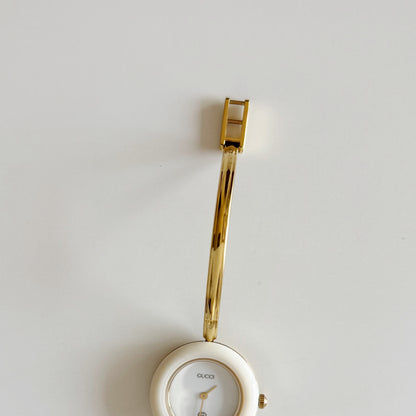 Gucci 1990s Interchangeable Bezel Gold Plated Bangle Watch with 12 bezels, case