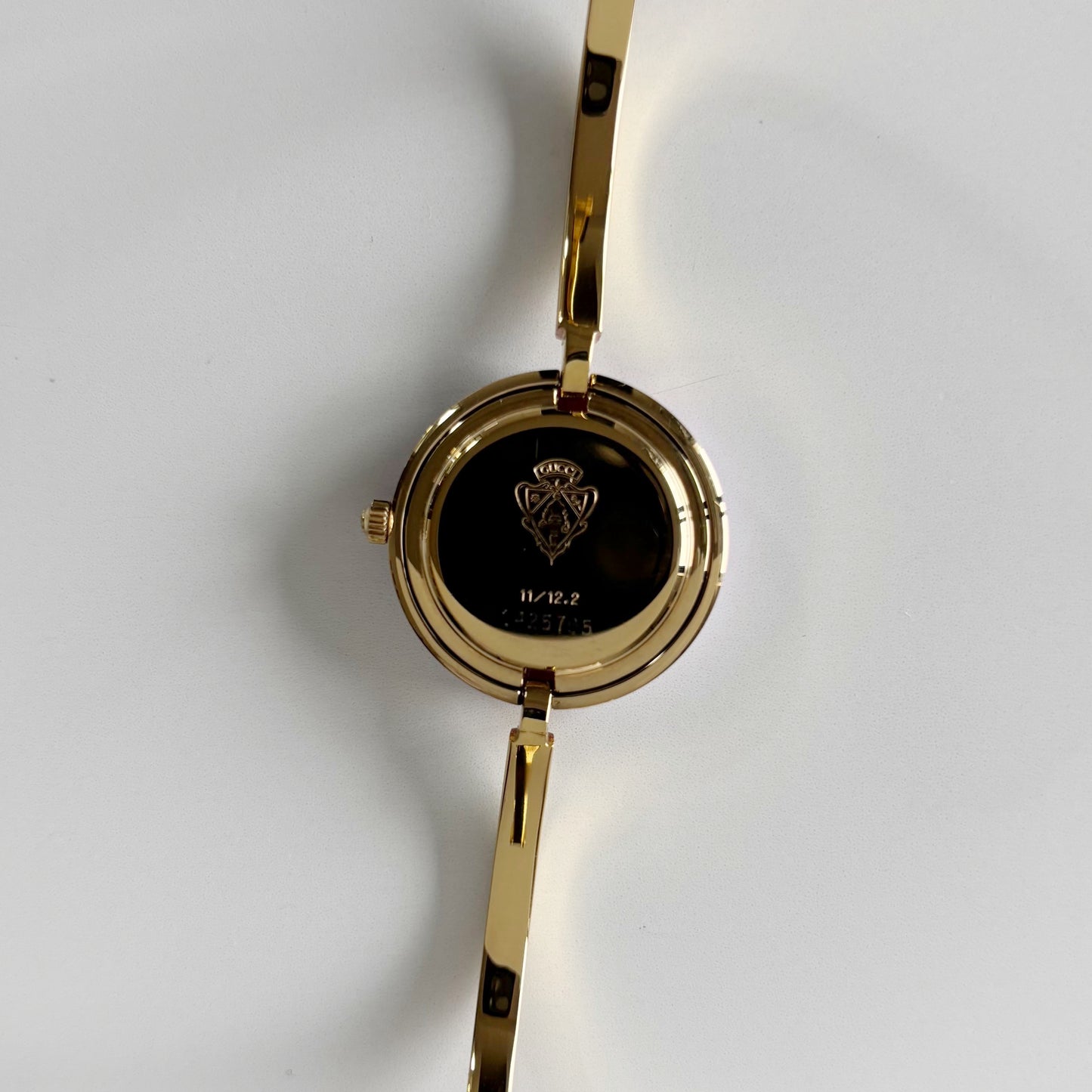 Gucci 1990s Interchangeable Bezel Gold Plated Bangle Watch with 12 bezels, case
