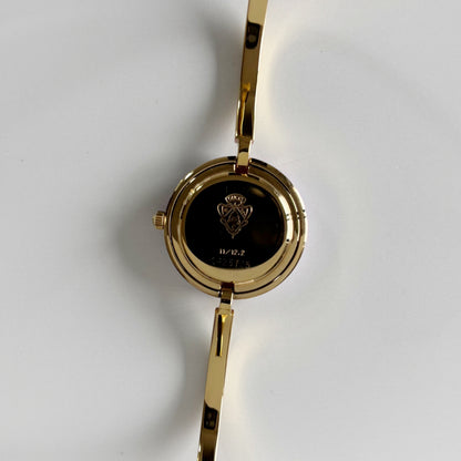 Gucci 1990s Interchangeable Bezel Gold Plated Bangle Watch with 12 bezels, case