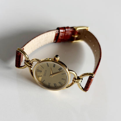Gucci 1990s Round Dial Horsibit Gold Plated Watch