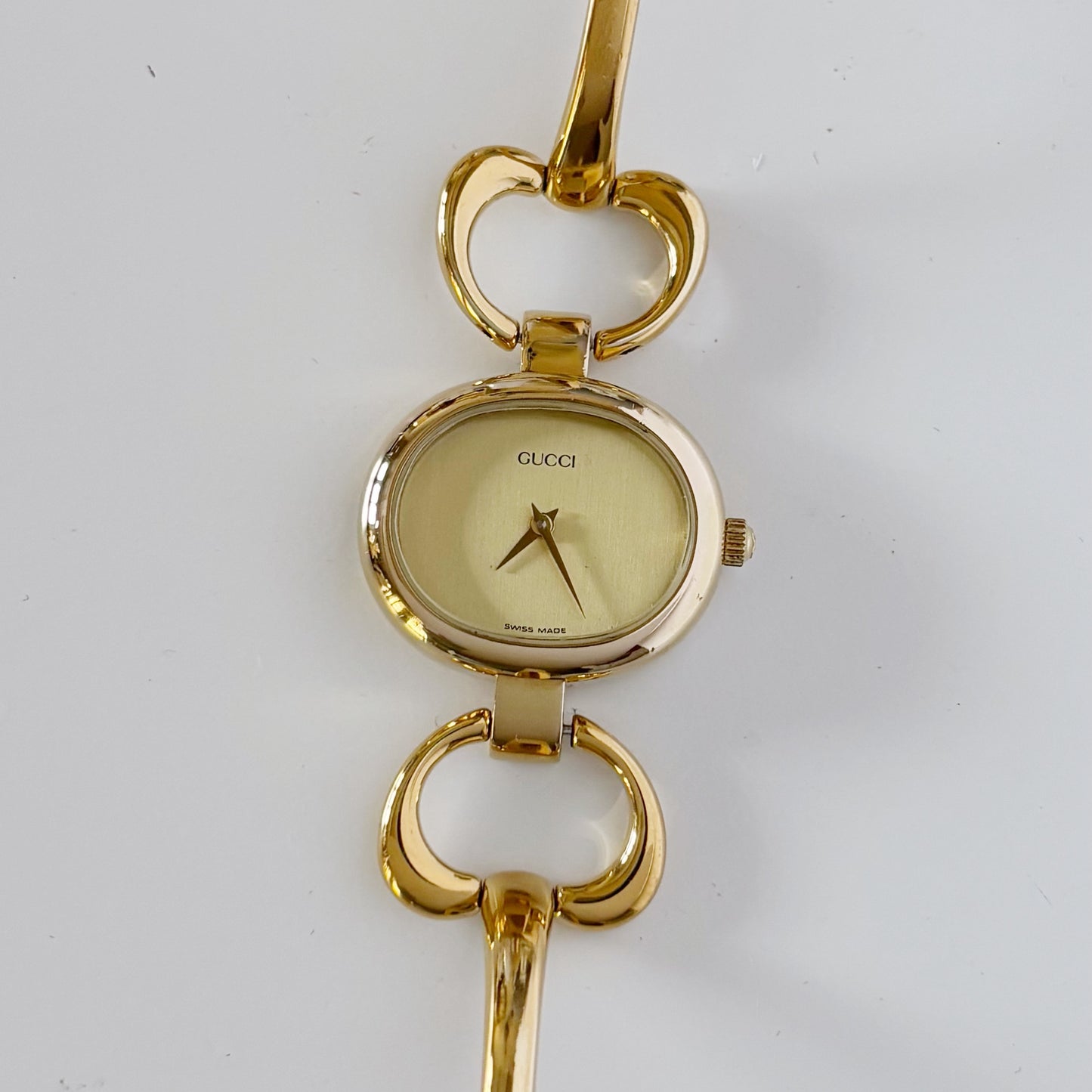 Gucci 1990s Oval Gold Plated Bangle Watch