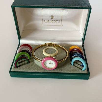 Gucci 1990s Interchangeable Bezel Gold Plated Bangle Watch with 12 bezels, case