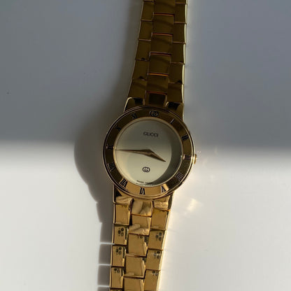 Gucci 1990s Gold Plated Round Watch