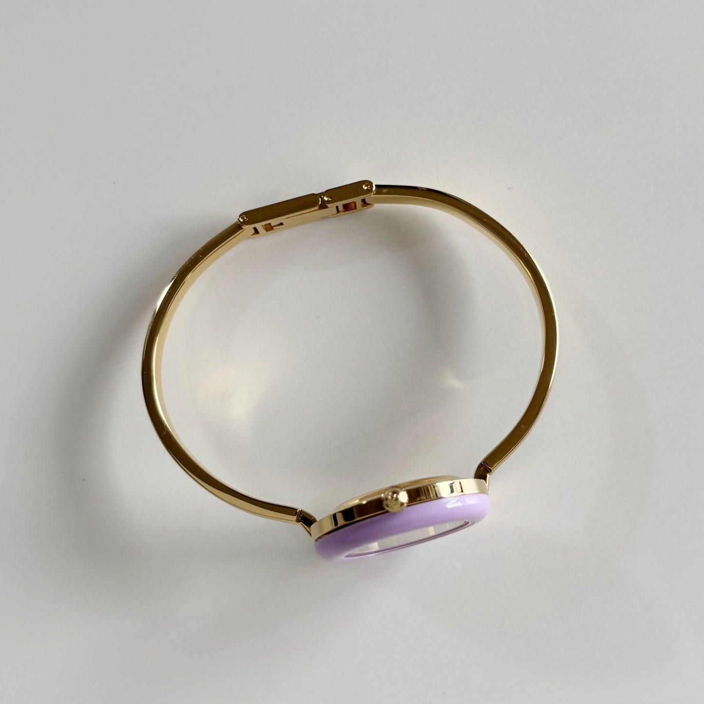 Gucci 1990s Interchangeable Bezel Gold Plated Bangle Watch with 12 bezels, case