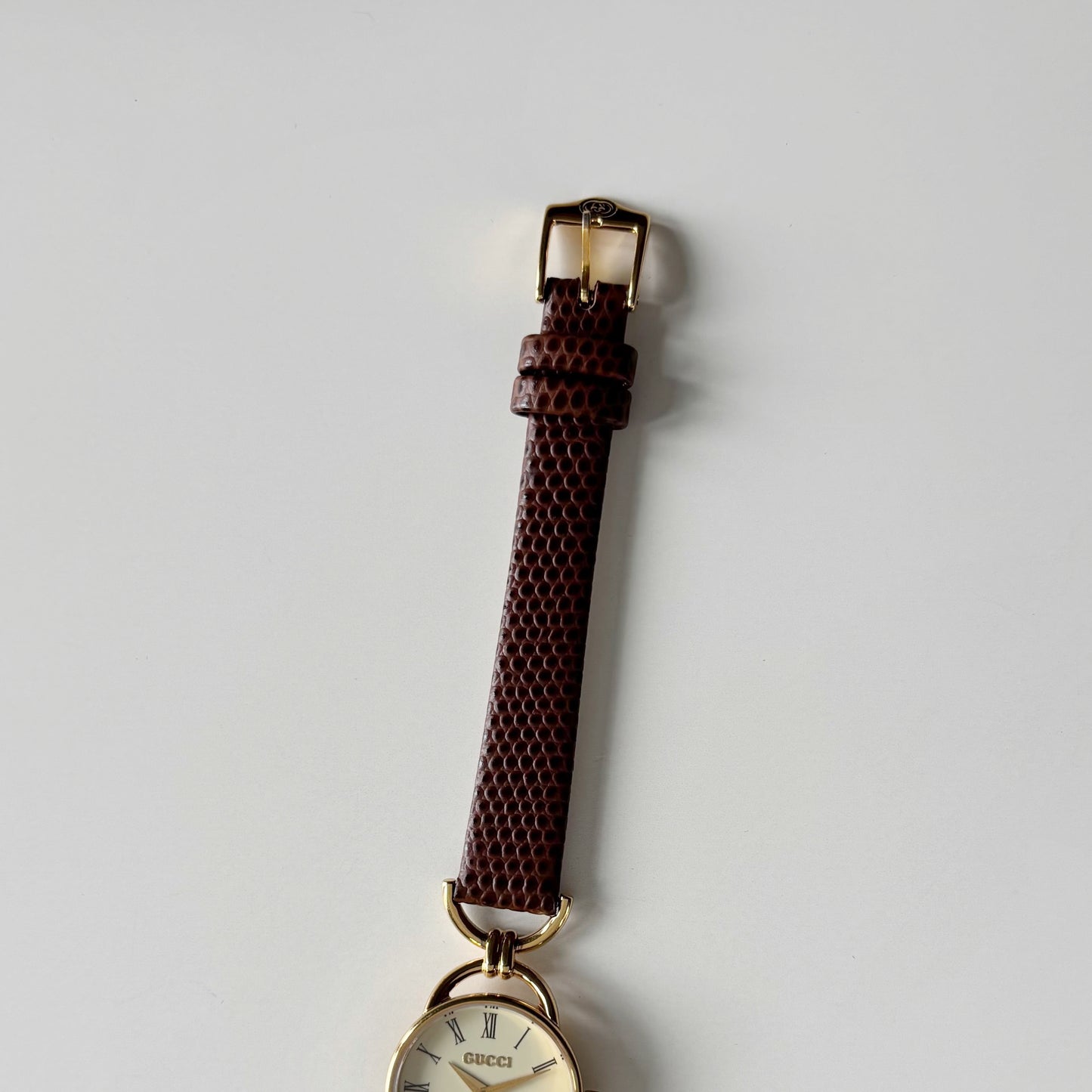 Gucci 1990s Round Dial Horsebit Gold Plated Watch