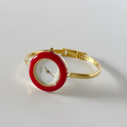 Gucci 1990s Interchangeable Bezel Gold Plated Bangle Watch with 12 bezels, case (Small)