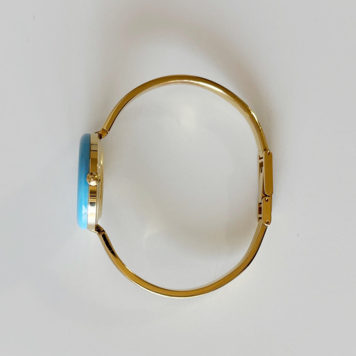 Gucci 1990s Interchangeable Bezel Gold Plated Bangle Watch with 12 bezels, case