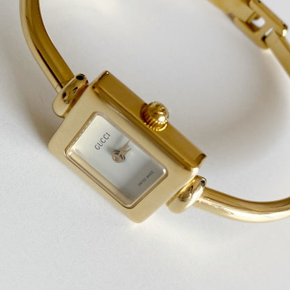 Gucci 1990s Square Dial Gold Plated Bangle Watch
