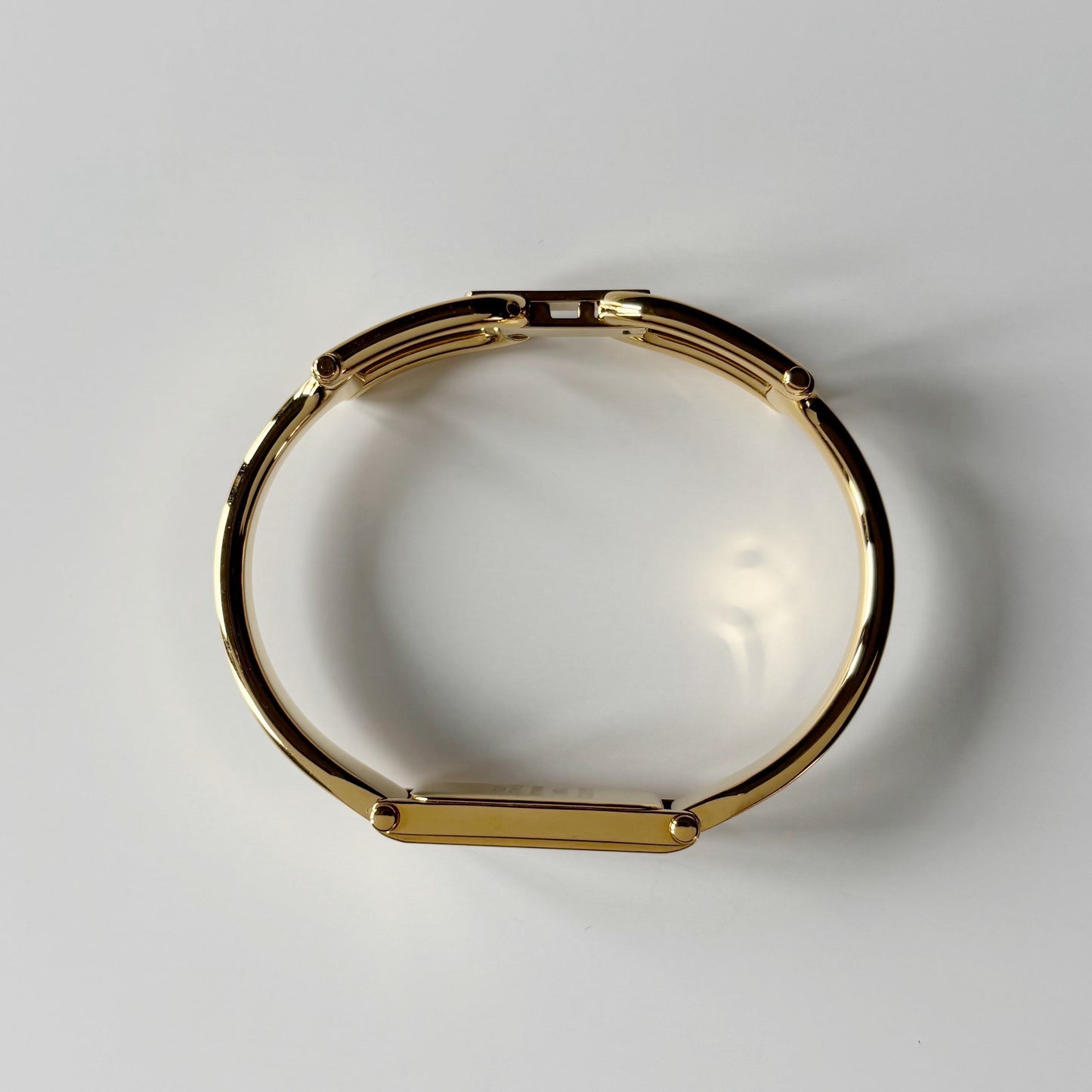 Gucci 1990s Seashell Rectangular Dial Gold Plated Bangle Watch