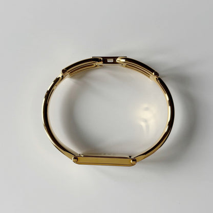 Gucci 1990s Seashell Rectangular Dial Gold Plated Bangle Watch