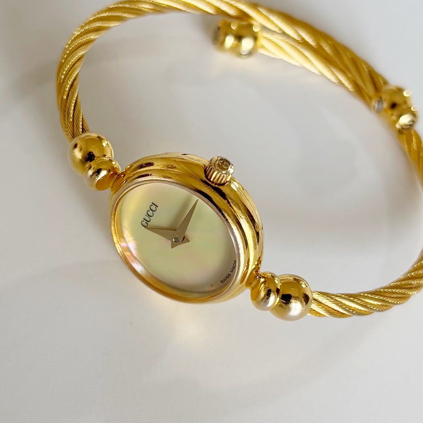 Gucci 1990s Seashell Dial Gold Plated Cable Bangle Watch