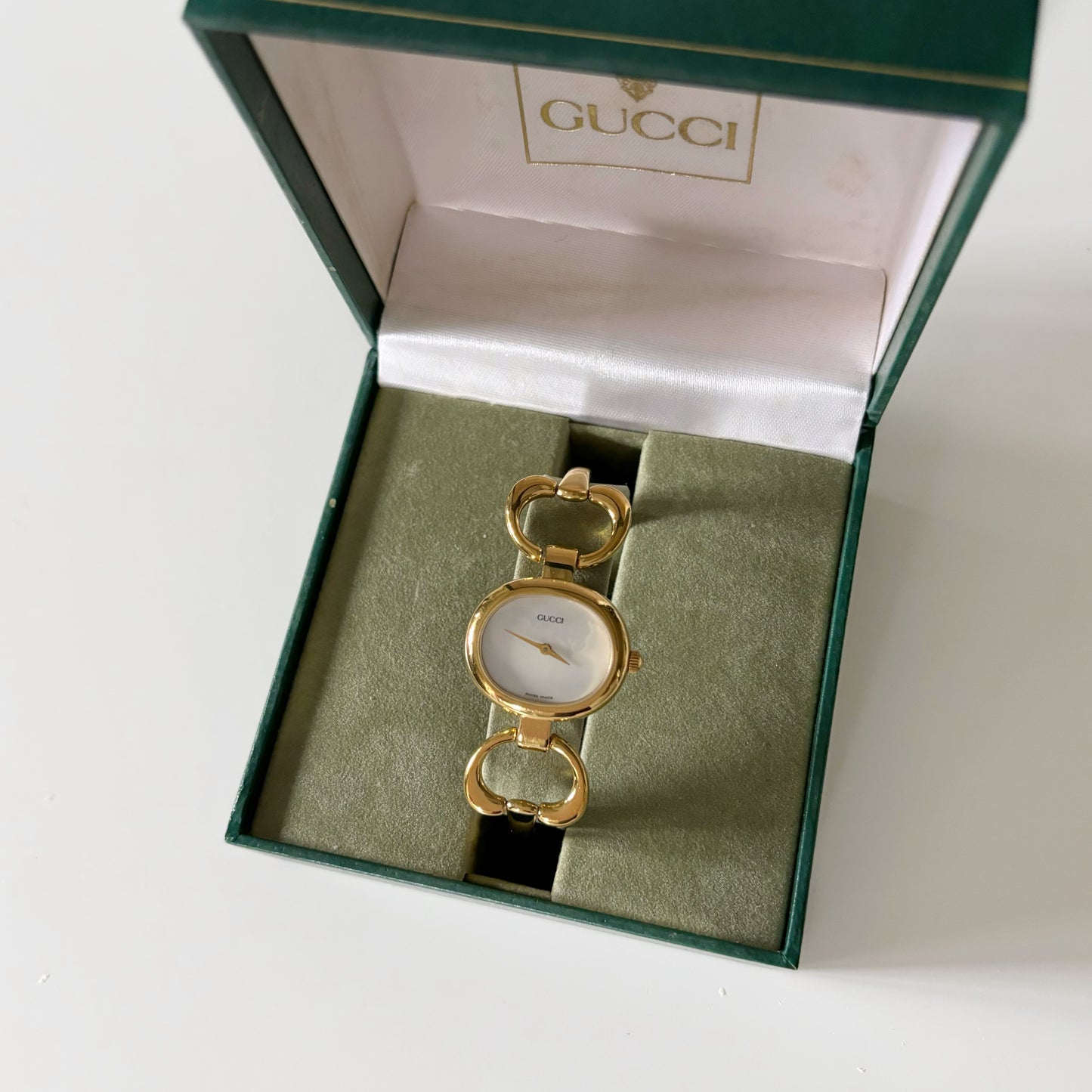 Gucci 1990s Seashell Dial Oval Gold Plated Bangle Watch