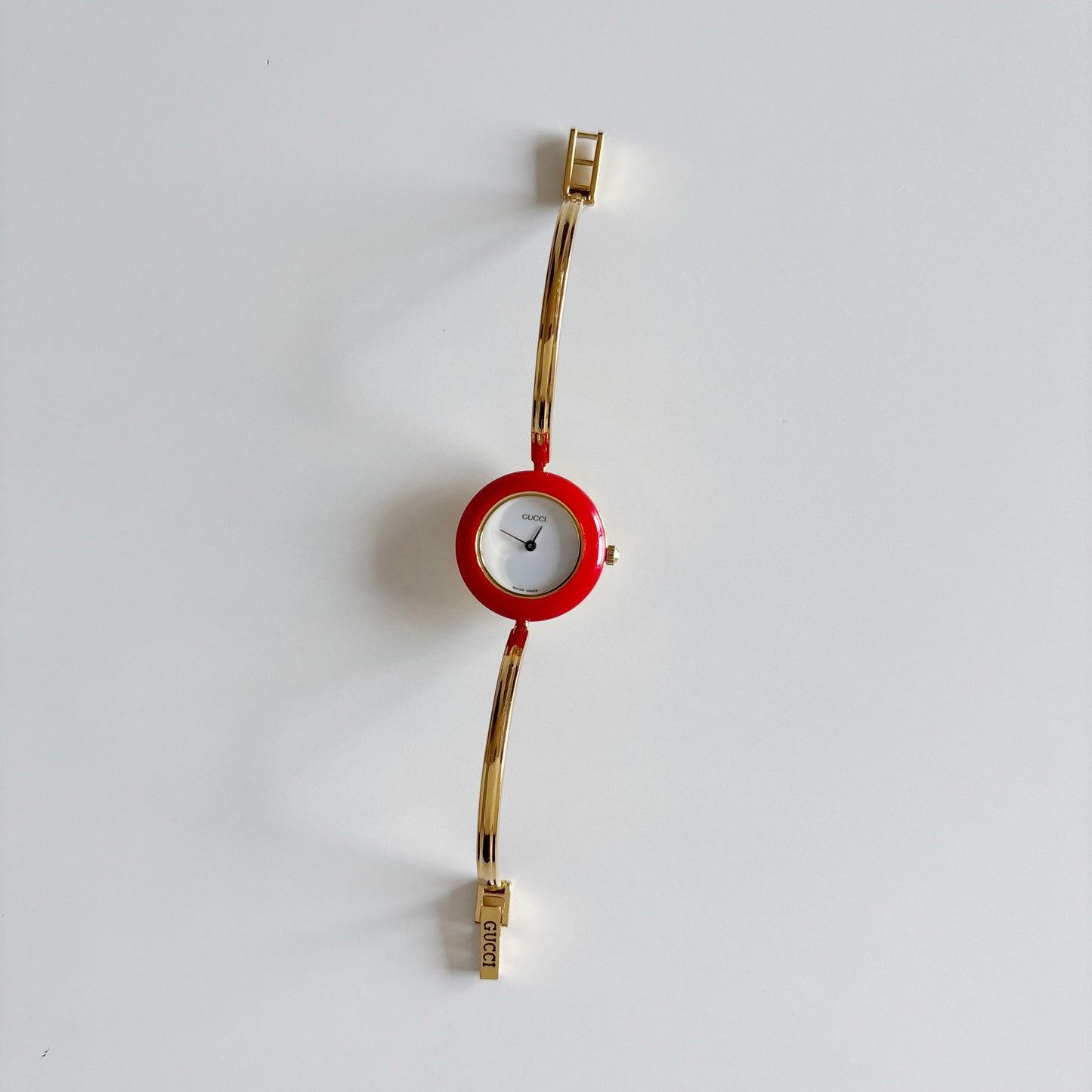 Gucci 1990s Interchangeable Bezel Gold Plated Bangle Watch with 12 bezels, case