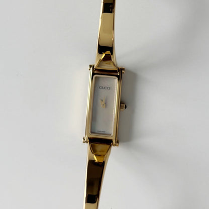 Gucci 1990s Seashell Rectangular Dial Gold Plated Bangle Watch