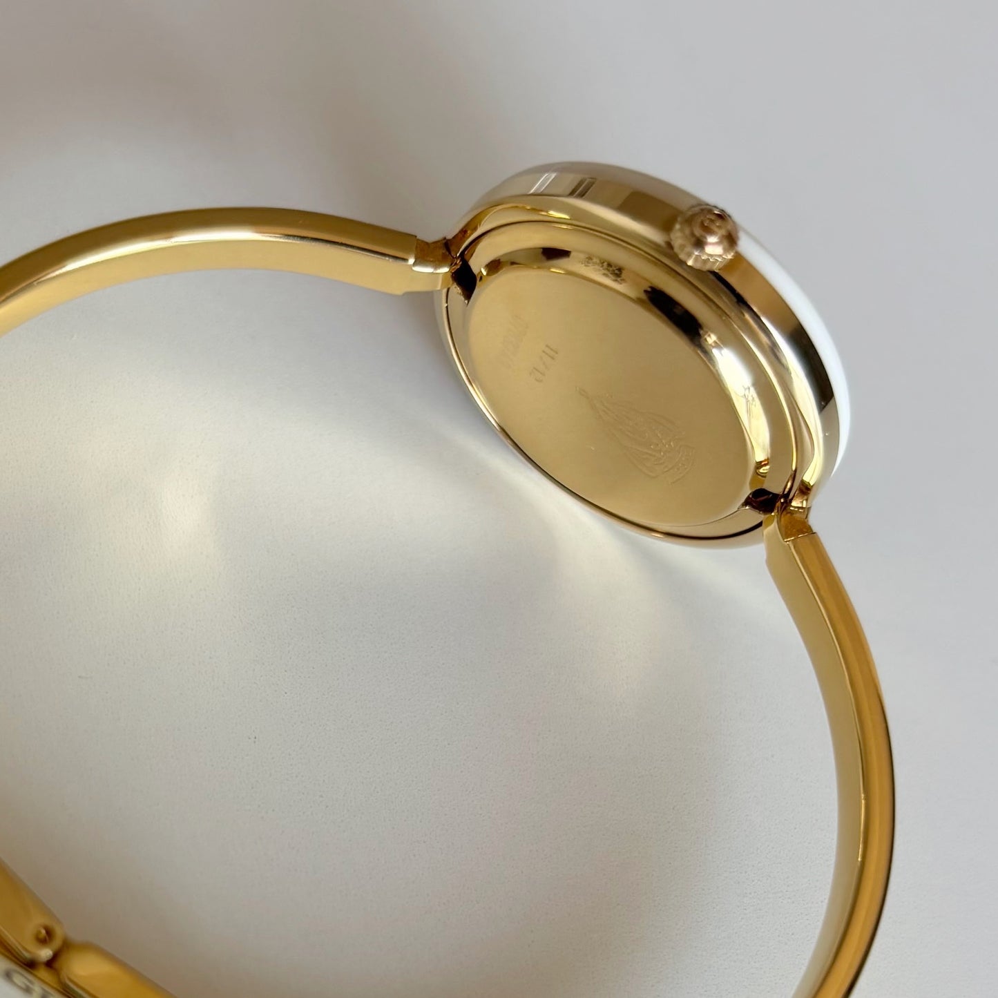 Gucci 1990s Interchangeable Bezel Gold Plated Bangle Watch with 12 bezels, case