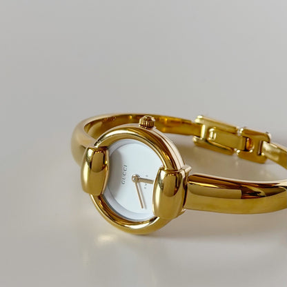 Gucci 1990s Round Dial Gold Plated Bangle Watch