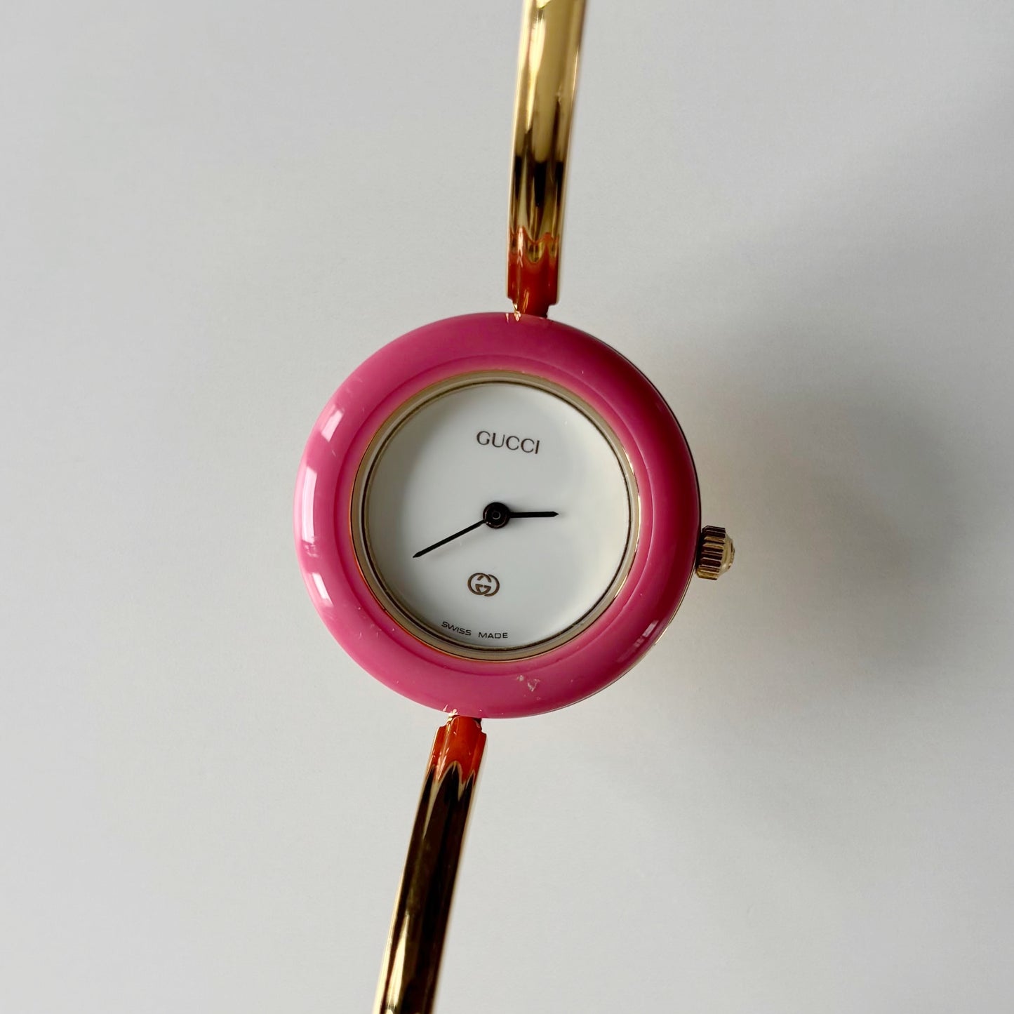 Gucci 1990s Interchangeable Bezel Gold Plated Bangle Watch with 12 bezels, case
