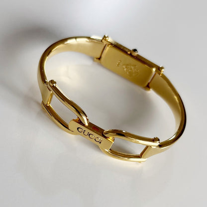 Gucci 1990s Rectangular Seashell Dial Gold Plated Bangle Watch