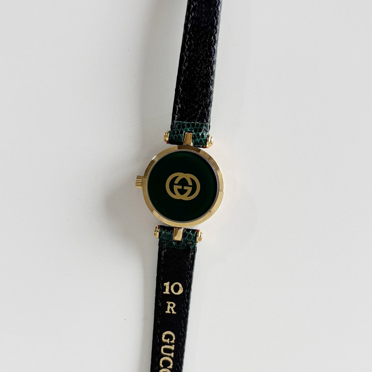 Gucci 1990s Round Dial Green Gold Plated Watch