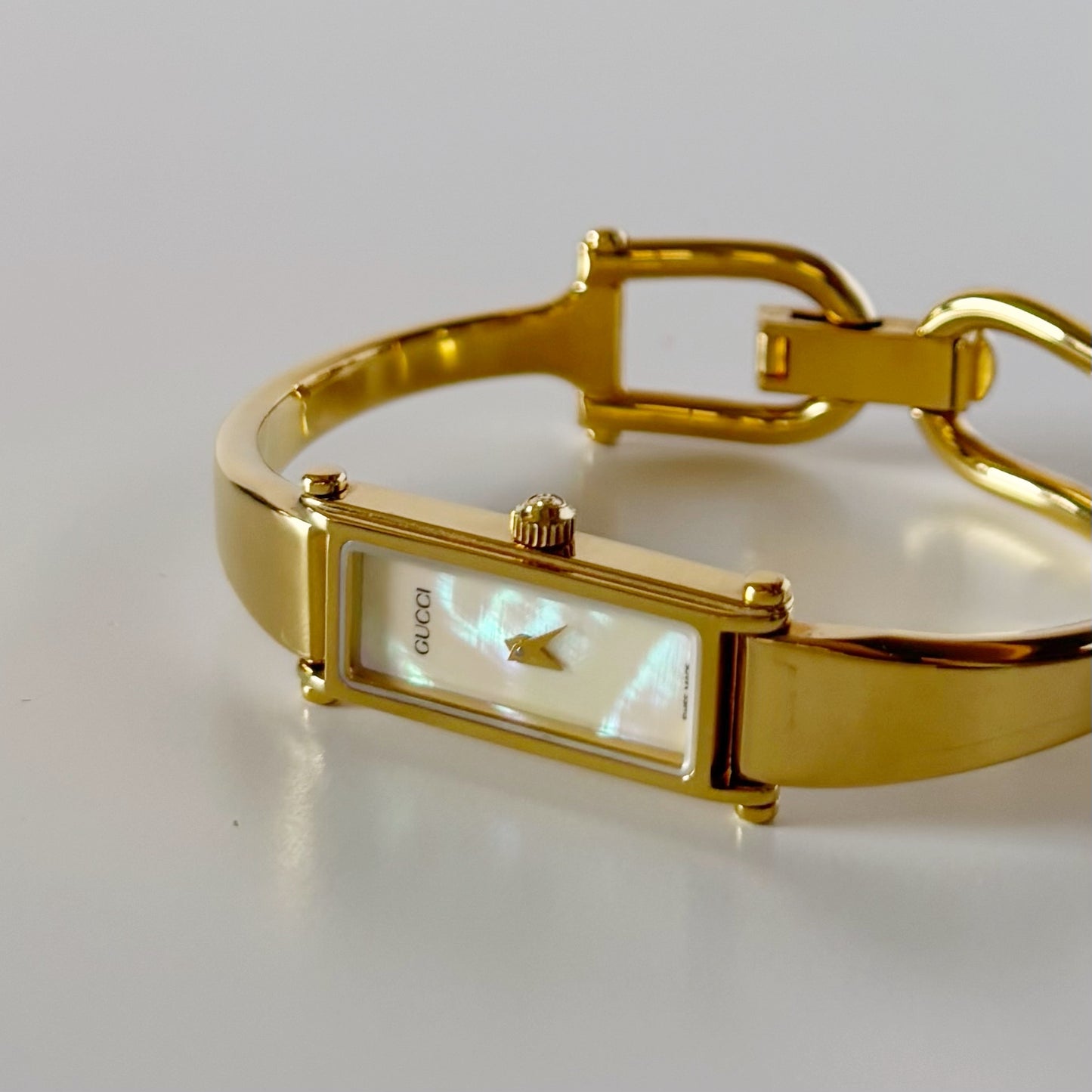 Gucci 1990s Seashell Rectangular Dial Gold Plated Bangle Watch