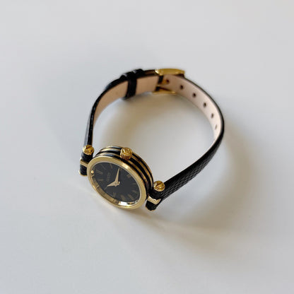 Gucci 1990s Black Round Dial Gold Plated Watch