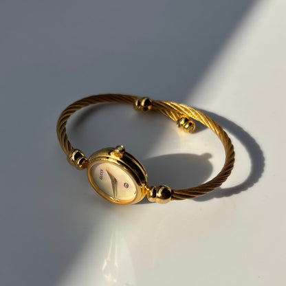 Gucci 1990s Seashell Dial Cable Gold Plated Bangle Watch