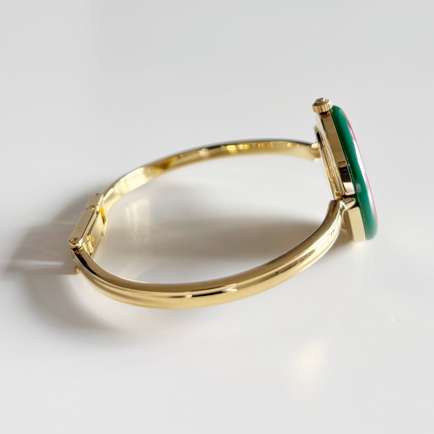 Gucci 1990s Interchangeable Bezel Gold Plated Bangle Watch with 12 bezels, case