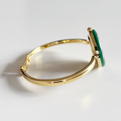 Gucci 1990s Interchangeable Bezel Gold Plated Bangle Watch with 12 bezels, case