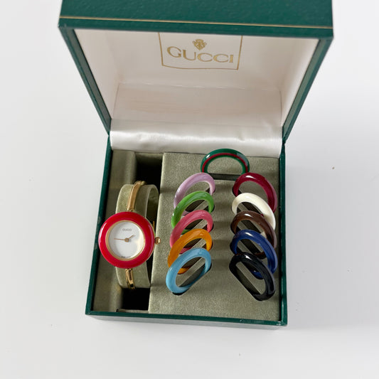 Gucci 1990s Interchangeable Bezel Gold Plated Bangle Watch with 12 bezels, case (Small)