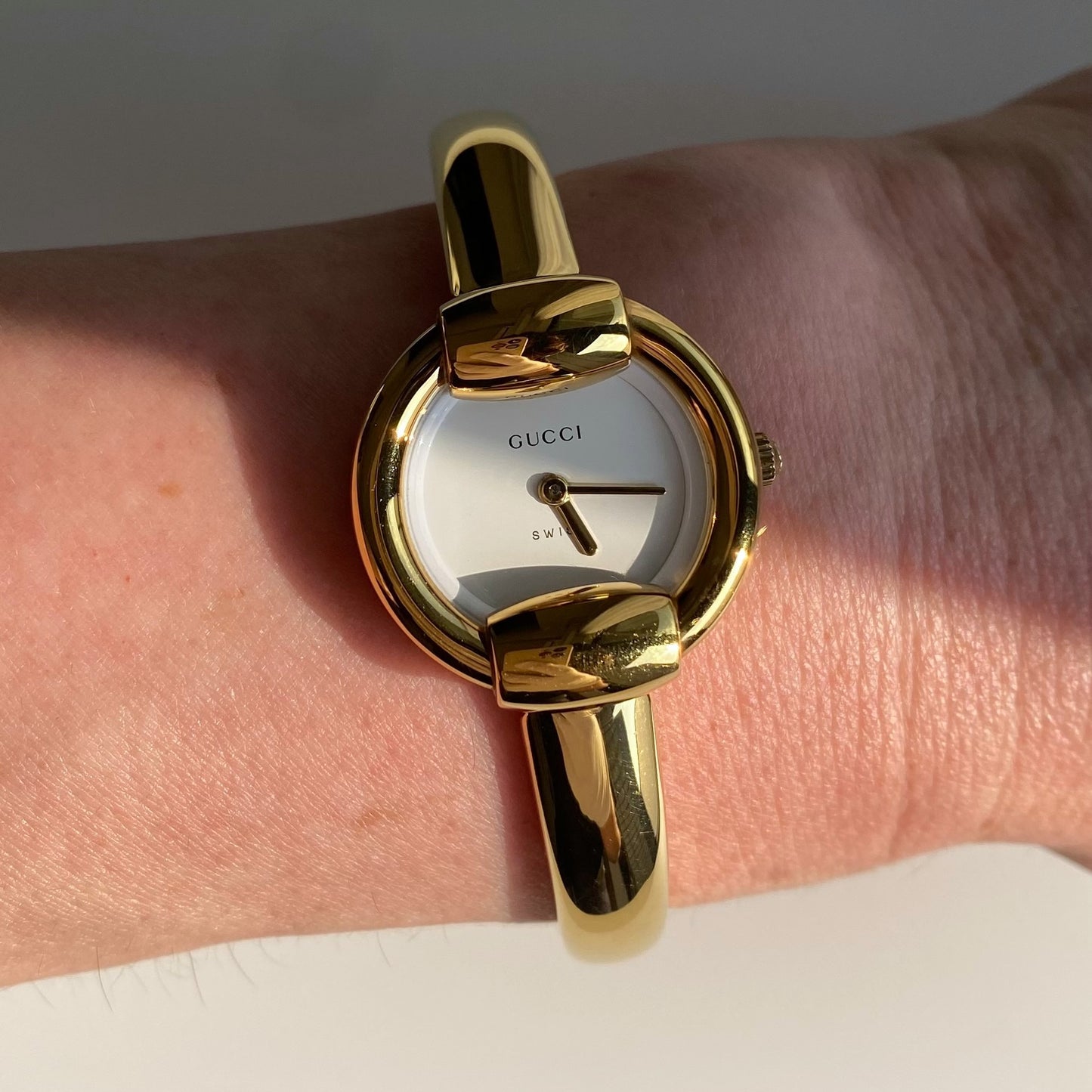 Gucci 1990s Round Dial Gold Plated Bangle Watch