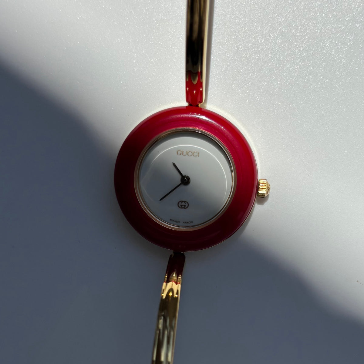 Gucci 1990s Interchangeable Bezel Gold Plated Bangle Watch with 12 bezels, case
